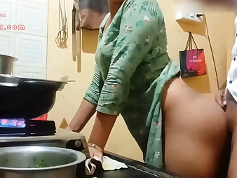 Observe this Indian Milf with a ample booty get down and sloppy in the kitchen
