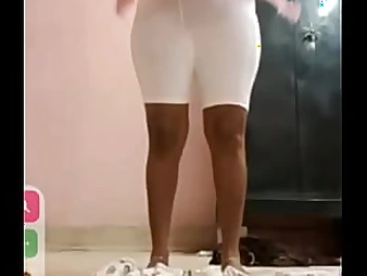 Witness this South Indian damsel unwrap and taunt in a silent and unwrapping way